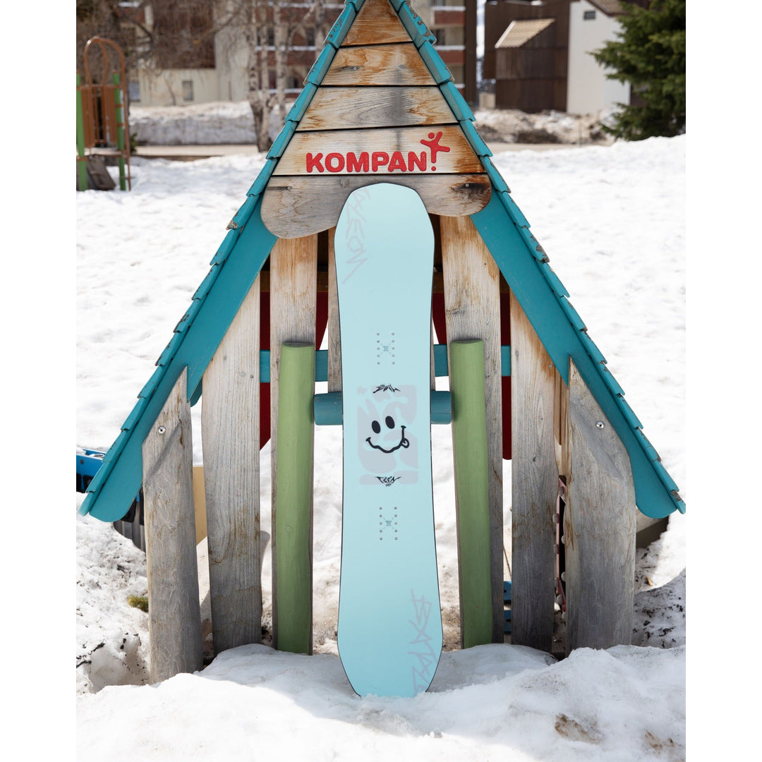 2027 Bataleon Evil Teen Youth Snowboard — Board lifestyle photograph