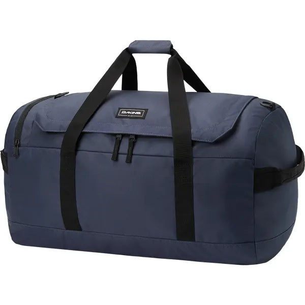 A navy blue duffel bag with black webbing handles and a black brand patch on the front, shown against a plain white background.